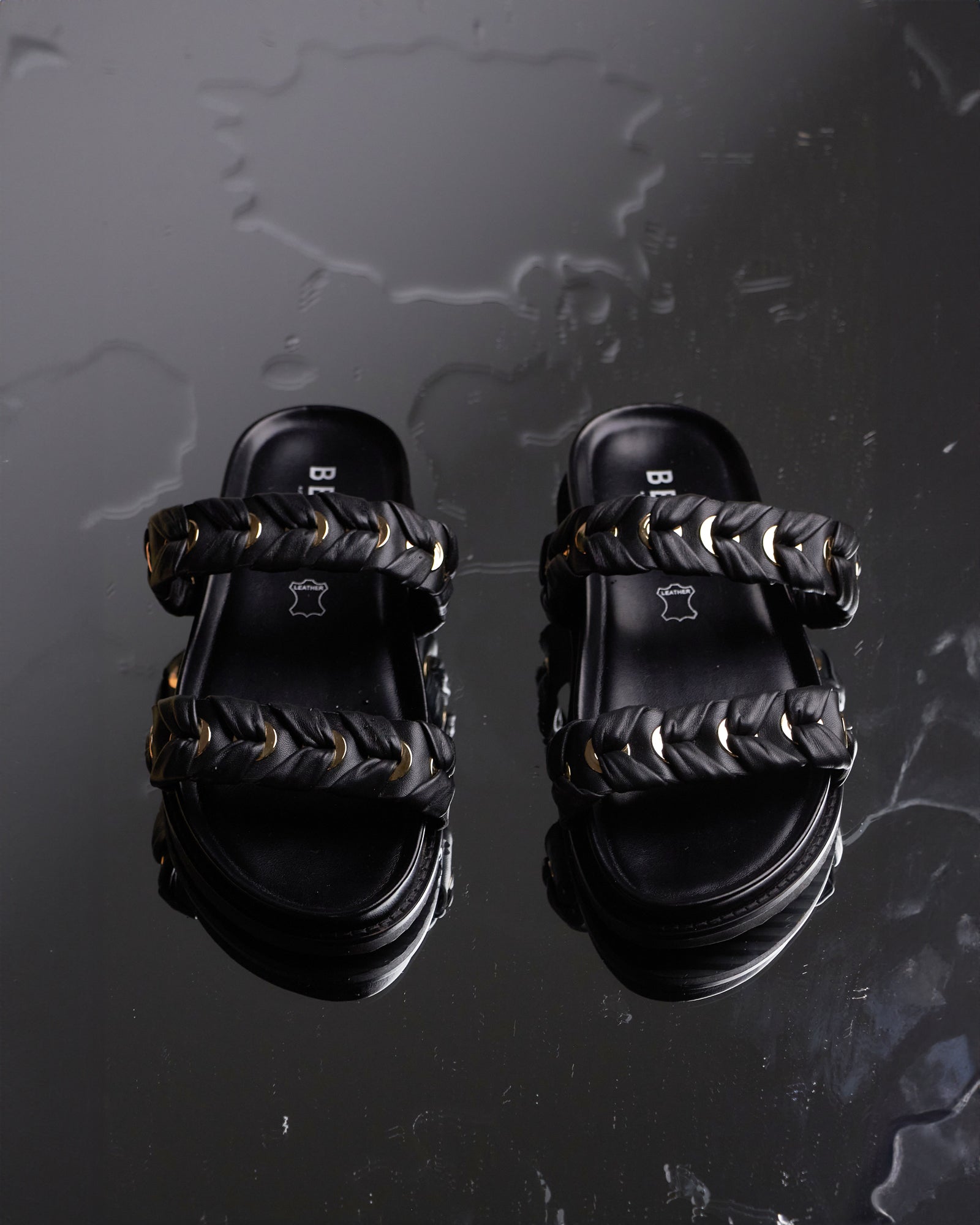 Buy TUVALU Double Band Leather Slides by Betts online Betts